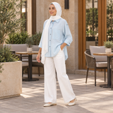 قميص حريمي أزرق فاتح بملمس مجعّد